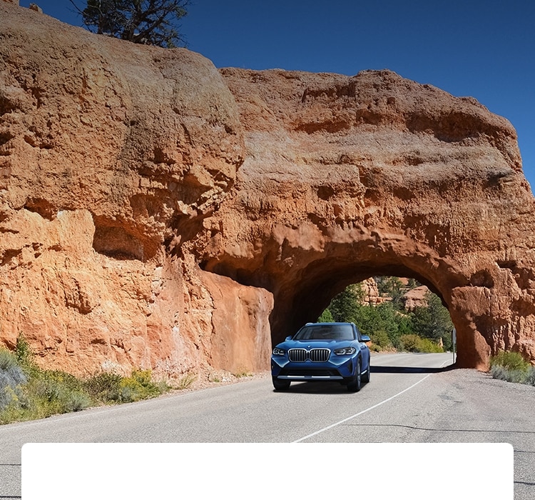 BMW SAV driving under a tunnel in Utah