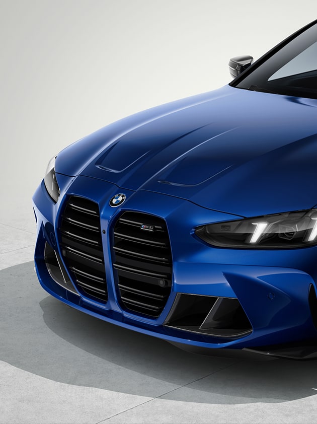 Detail shot of the iconic BMW M kidney grille finished in high-gloss black