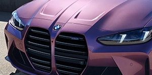 BMW M4 Competition xDrive Convertible shown in BMW Individual Velvet Orchid paint finish