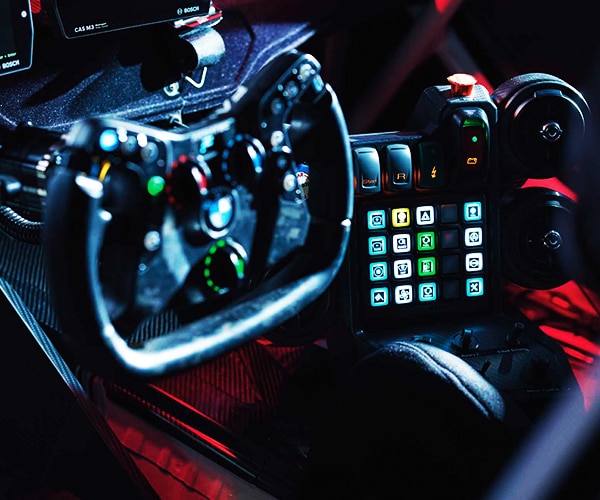 Detail of revolutionary steering wheel and driver controls of the BMW M4 GT3