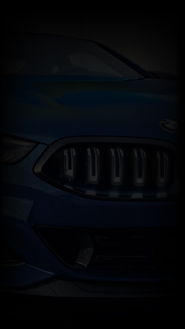 Close-up silhouette of the front of a 2026 BMW 8 Series Coupe